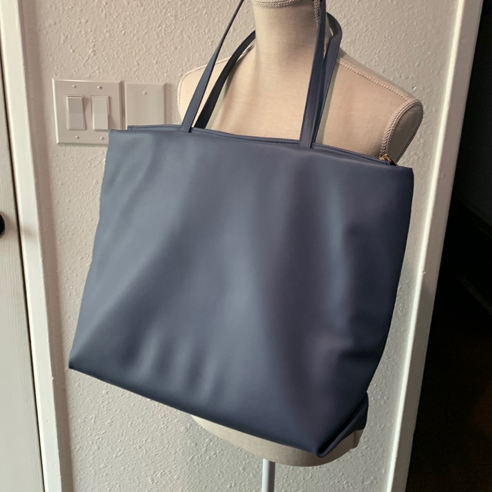 A New Day !!  This over size soft fabric purse  sky blue